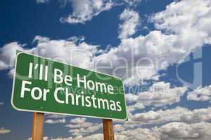 i'll be home for christmas green road sign over sky
