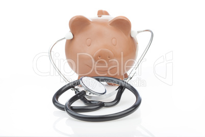 piggy bank wearing a stethoscope
