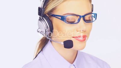 Beautiful telesales lady at her computer