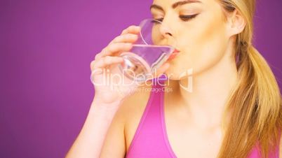 fitness woman drinking water