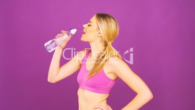 fit woman drinking water