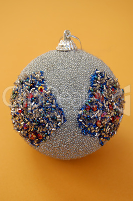 silver christmas bauble with glitter