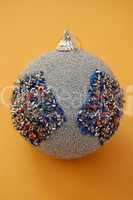 silver christmas bauble with glitter