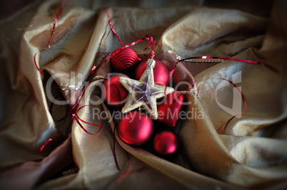 red baubles and golden star christmas ornaments