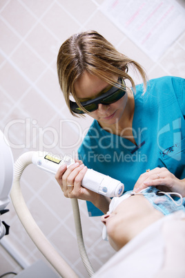 patient undergoing skin treatment with a laser