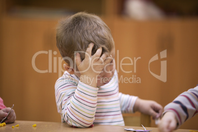 cute little child in kindergarten class