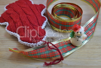 decorative ribbon and santa claus toy  as