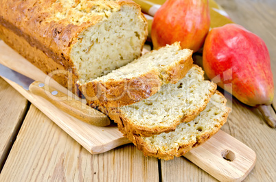 fruitcake with pears on a board