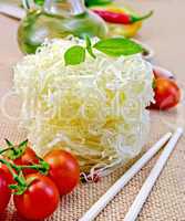 noodles rice twisted with oil and vegetables on sacking