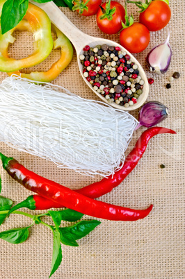noodles rice white with a variety peppers and vegetables