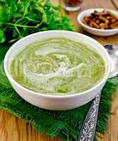 puree green in a bowl on the board