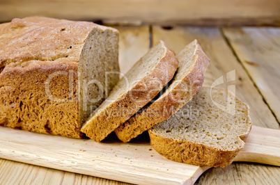 Rye homemade bread sliced on the board