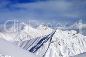 off-piste slope and snowy mountains