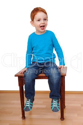 child sits on the stool