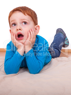 boy lying on the floor