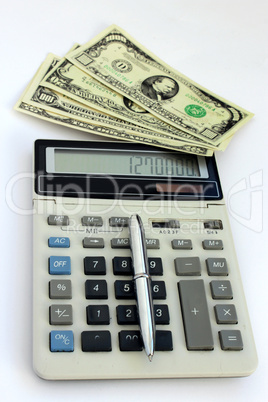 dollar bank notes, calculator and pen
