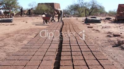 Adobe Brick Making Far Dolly