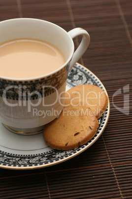 a cup of tea with biscuits
