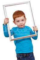boy holding picture frame