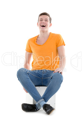 young man laughing out loud, on white background