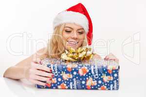 beautiful christmas girl with gift box