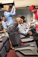 flight attendant check passenger tickets cabin