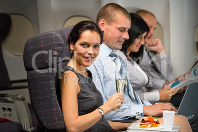 business travel by plane woman enjoy refreshment