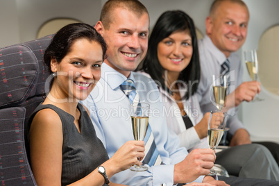 business people flying airplane drink champagne