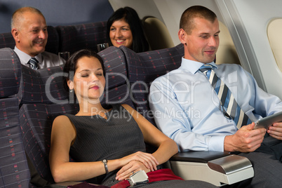 airplane passenger relax during flight cabin sleep