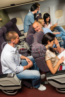 leisure travel people enjoy flight airplane cabin