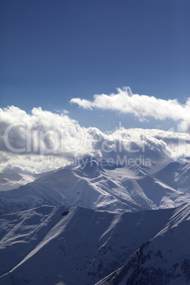 snowy mountains at evening