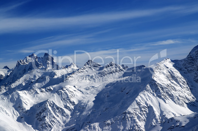 snowy sunlight mountains, view from ski slope