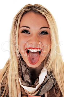 girl showing pierced tongue.