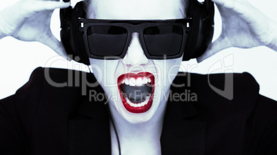 dramatic portrait of a woman in headphones