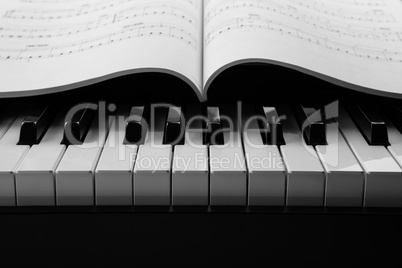 piano keys and musical book