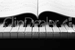 piano keys and musical book