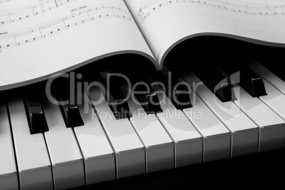 piano keys and musical book