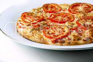 pizza on a white plate