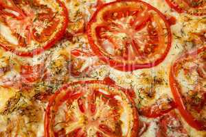 pizza with red tomato circles
