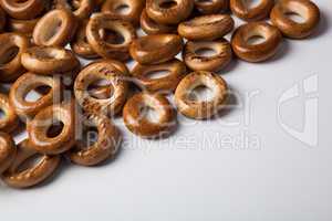 a bunch of bagels on a white background