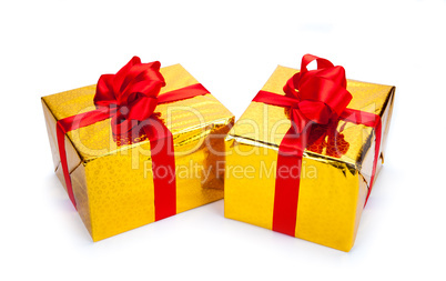 two gold gift boxes