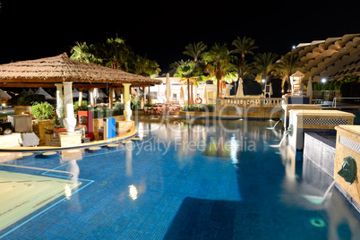 swimming pool in night illumination at the luxury hotel, sharm e