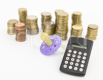 pacifier with hard money and pocket calculator