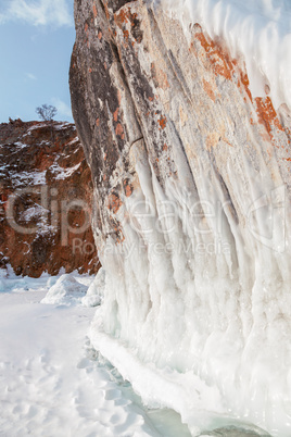 coastal cliffs at frozen baikal lake in winter