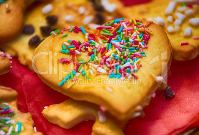 Mixed cakes on a red tray, Christmas classic biscuits