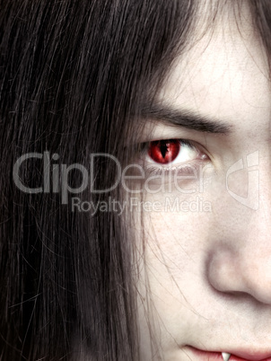 face of a young male vampire close up