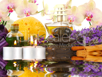 Accessories for spa with orchids, lavender, stones, candles and