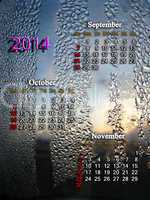 calendar for autumn of 2014 year with drops of water