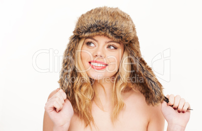 naked blonde woman in fur hat