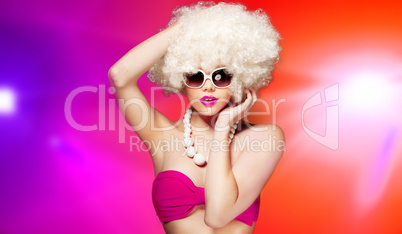 glamorous woman with a blond afro hairstyle